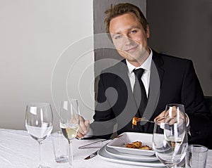 Business man is having lunch