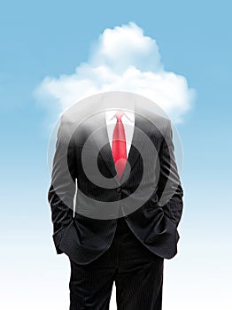 Business man with head in the clouds