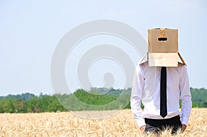 Business Man hiding face