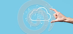 Business man hold,holding cloud computing data and security on global networking,Padlock and cloud icon. Technology of business.