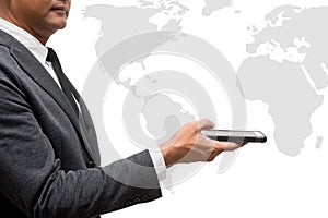 Business man hold smart phone with wolrd map photo