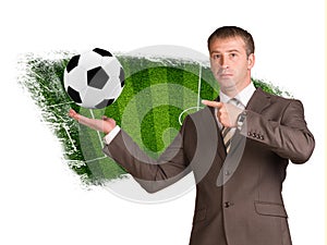 Business man hold soccer ball in hand