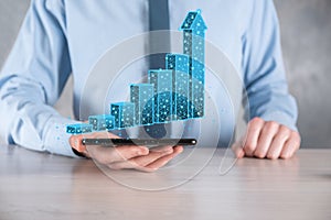 Business man holding 3D graphs low polygonal and stock market statistics gain profits. Concept of growth planning,business