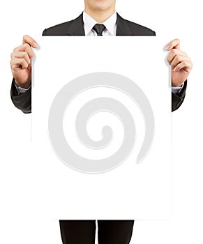 Business man holding blank paper isolated on white background.