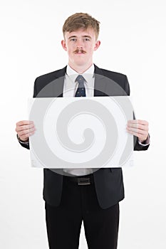 Business man holding blank paper on white background