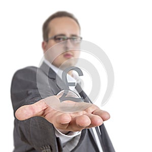 Business man holding a british pound sterling sign