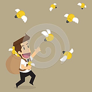 Business man holding bulb idea that fly, brainstormt
