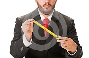 Business man holding a centimeter