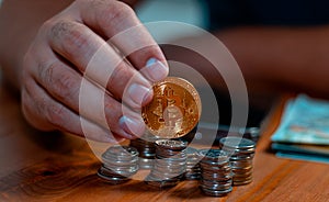 business man holding a coin cost support and saving money financial service concept and saving