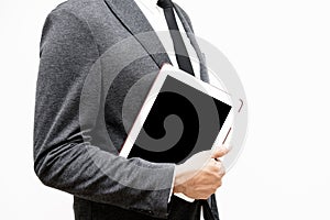 Business man holding computer tablet