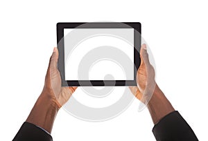 Business man holding digital tablet