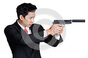 Business man holding gun shoot