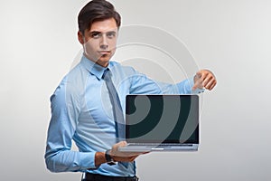 Business man holding a laptop against a white background