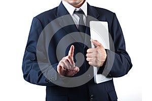 Business man holding laptop and pushing on touch screen icon