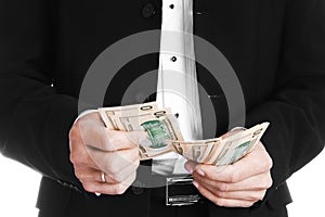 Business man holding money on white background