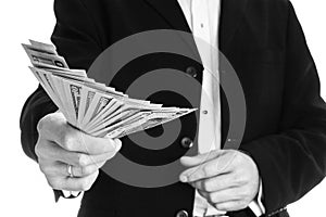 Business man holding money on white background