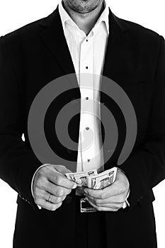 Business man holding money on white background