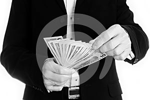 Business man holding money on white background