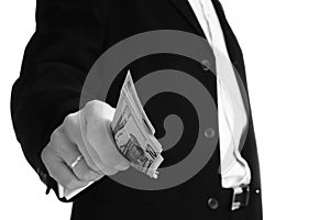 Business man holding money on white background