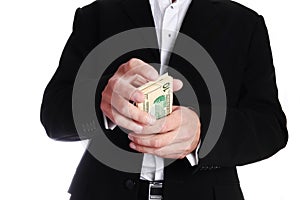 A Business man holding money on white background