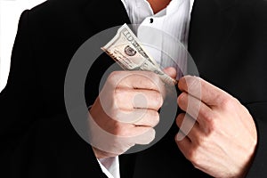 A Business man holding money on white background