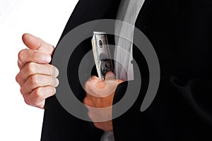 A Business man holding money on white background