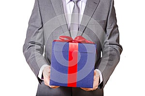 Business man holding present box