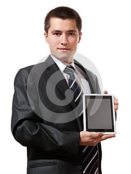 Business man holding and shows touch screen tablet