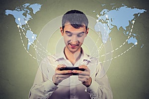 Business man holding smartphone connected browsing internet worldwide