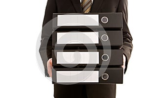 Business man holding three folders