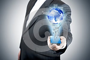 Business man holding touch screen mobile