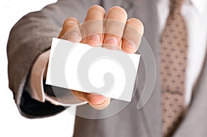 Business man holding visiting card