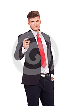 Business man holds a marker