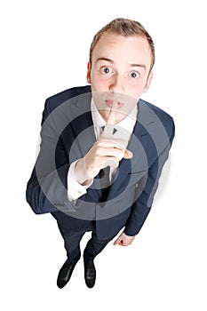 Business man hushing