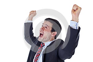 Business man jubilates with raised clenched fists