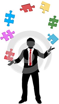 Business man juggling puzzle pieces problems