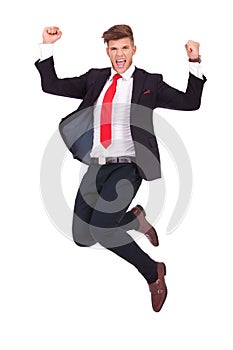 Business man jumping ecstatic