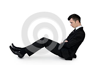 Business man leaning floor