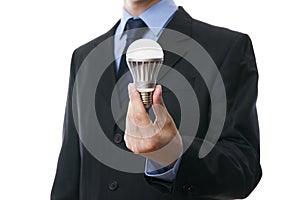 Business man with LED light bulb