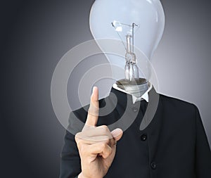 Business man light bulb head