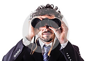Business man looking through binoculars