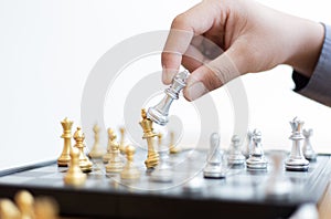 Business men make plans to play chess with Prudence and success photo