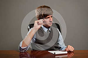 Business Man in Meeting Thinking with Notepad