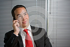 Business man with mobile hand cell phone