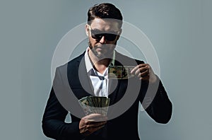 Business man with money banknotes. Male entrepreneur with dollar bills. Lucky boss, insurance agent, manager. Freelancer