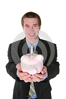 Business Man with Money (Focus on Piggy Bank)