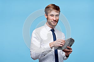business man with money wealth finance blue background