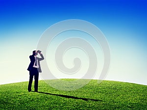 Business man observing nature telescope outdoors Concept