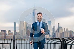 Business man outdoor portrait. Middle age businessman in NYC street. Mature age, mid adult man in 40s walk at Manhattan