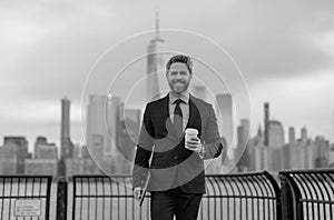 Business man outdoor portrait. Middle age businessman in NYC street. Mature age, mid adult man in 40s walk at Manhattan